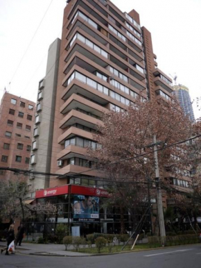 Гостиница Encomenderos Suites - Apartamentos Amoblados  Сантьяго